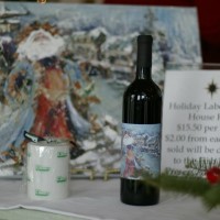 Santa in Fishtown painting by Rozanne Priebe and Red House Red from Black Star Farms
