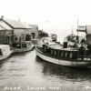 The Morning Dip was converted from sail to gasoline power. Leelanau Historical Society.