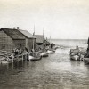 A photo that captures both sail-powered mackinaw boats and boats that were converted to gasoline engines, ca. 1905.  Barbara Gentile Collection.