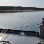 Preparing to use the winch to pull the Joy beneath part of the net.